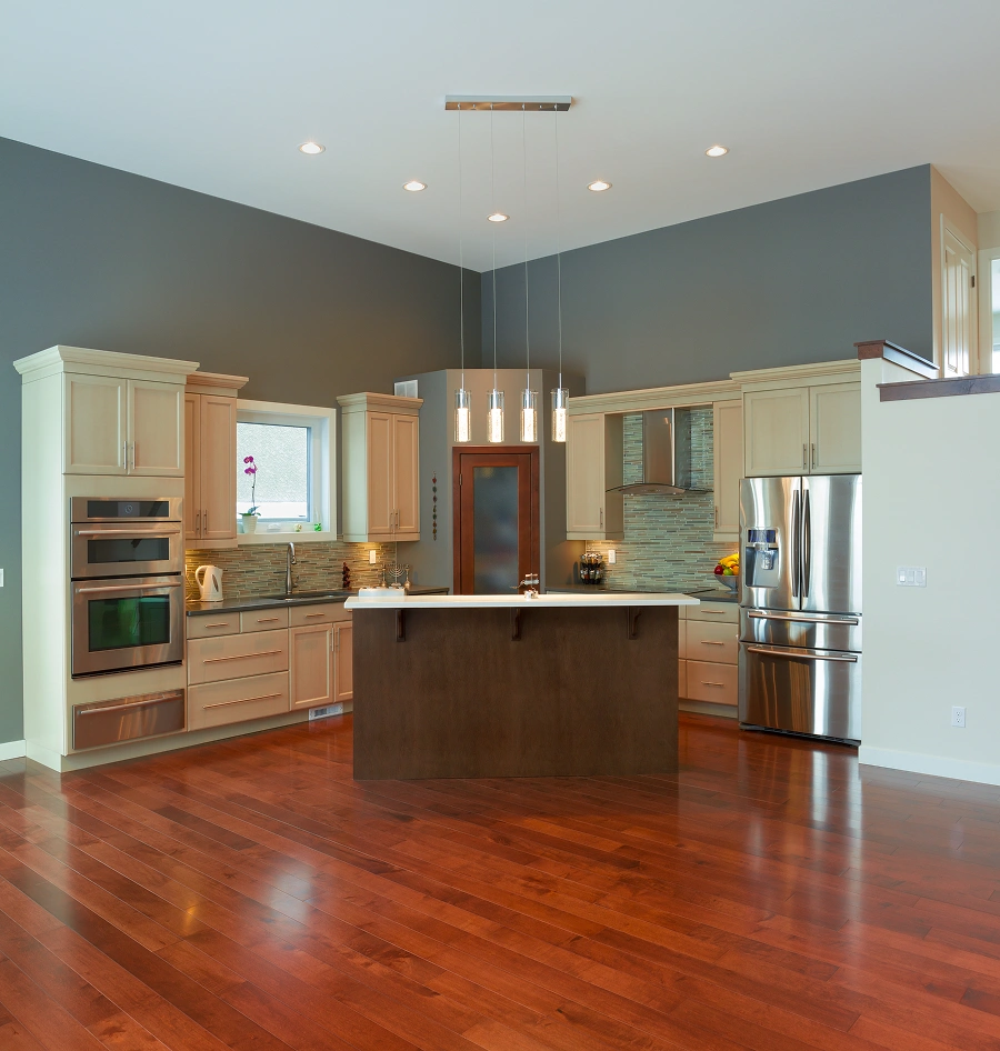Modern kitchen with wooden flooring