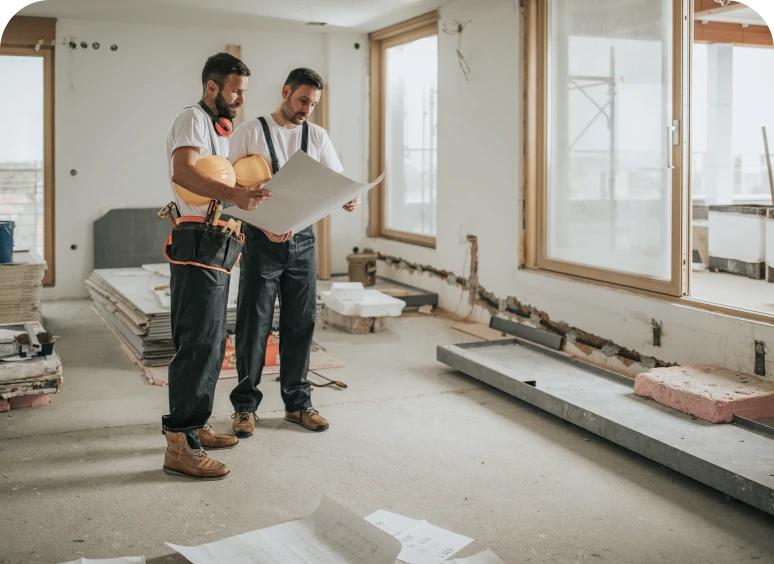 Contractors discussing renovation project indoors